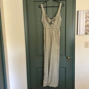 Romeo + Juliet small green and white striped jumpsuit. New with tags.